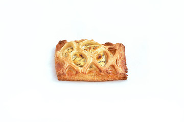 Rectangular puff pastry with a filling of cottage cheese. Closeup on a light background