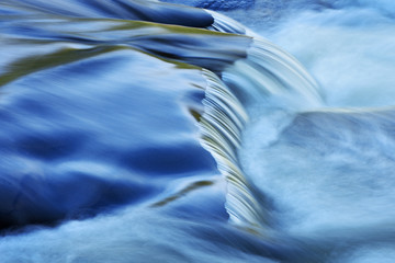 Abstract landscape of the Presque Isle River rapids captured with motion blur, Porcupine Mountains...