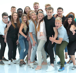 Obraz premium group of cheerful young people looking at the camera.