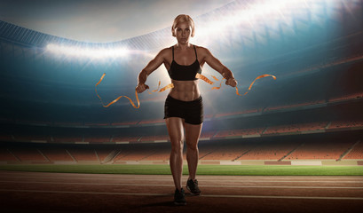 Fototapeta na wymiar Female athlete. Fitness workouts 