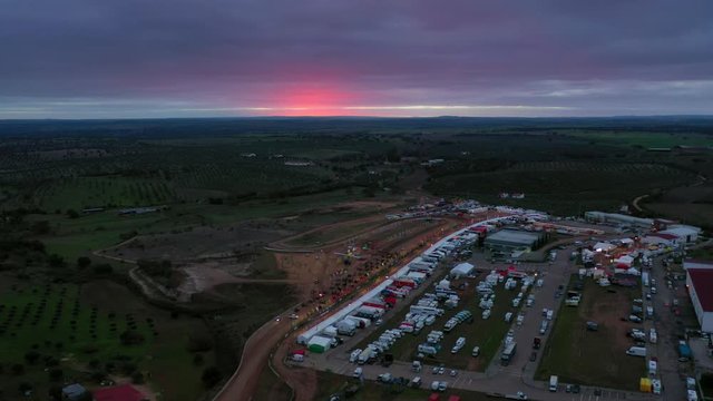 Atv ( SSV ) dirt race pole position aerial view during sunrise. Panoramic view shot by drone