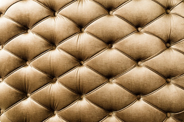 Front of upholstered furniture. Rhomboidal shape.