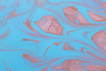 Abstract background of mixed shades of nail polish with a marble