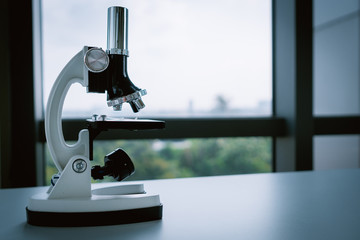 Microscope on the Desk in Laboratory
