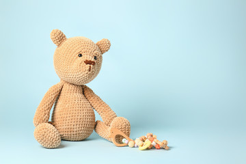 Baby toys on color background