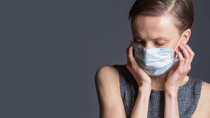 Young woman in medical mask to prevent disease, flu. Health safety concept