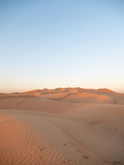Fototapeta na wymiar Sand dunes in Dubai sunset