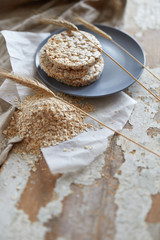 Cereal bread on vintage wooden table. Top side view with copy space. Selective focus