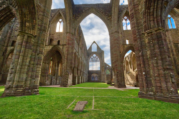 The ruins of Tintern Abbey, founded by Walter de Clare, Lord of Chepstow, on 9 May 1131. It is situated adjacent to the village of Tintern in Monmouthshire, Wales, UK.