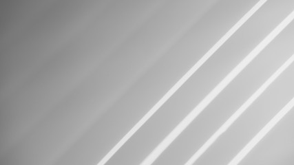 abstract shadow batten of lath and morning light on white concrete wall texture background