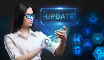 Business, Technology, Internet and network concept. Young businessman working on a virtual screen of the future and sees the inscription: Update