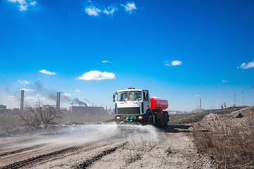 irrigating machine watering industrial mill tailing area