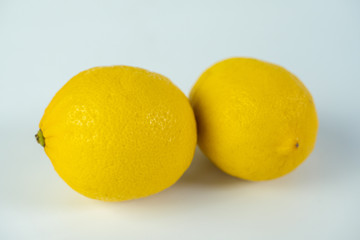 Fresh lemon fruit studio shot on white background.