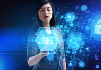 Business, Technology, Internet and network concept. Young businessman working on a virtual screen of the future and sees the inscription: Content marketing
