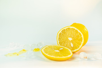 Fresh lemon iced with lemon sliced on white background.