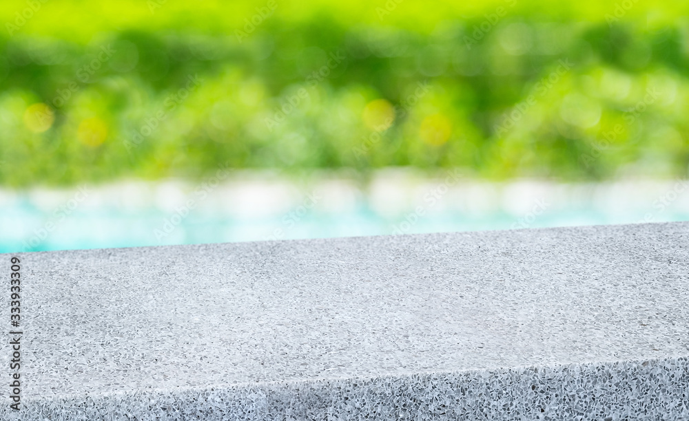 Aufkleber spring background.Empty diagonal pebble grey stone table with blur tree and pond in garden boekh background,banner mockup template for display of product