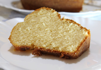 Fototapeta na wymiar Slice of homemade vanilla cake