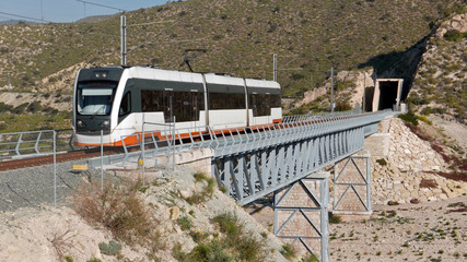 Train on the viaduct of d'Aigues Bixes, in the railway line between Alicante and Benidorm