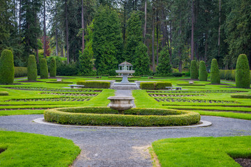 Beautiful fountain in the middle of the park. Amazing park landscape. Manito Park and Botanical Gardens, Spokane, Washington, United States