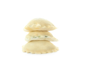 Raw ravioli on white background