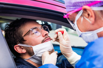 Doctor taking a nasal swab test