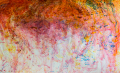 abstract color background of paints mixed in water