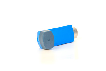 Blue Asthma inhaler isolated on a white background. Disease concept.