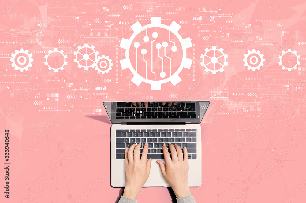 Poster automation concept with person using a laptop computer