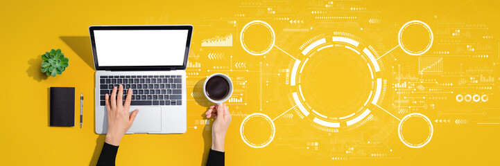 Tech circle with person using a laptop computer