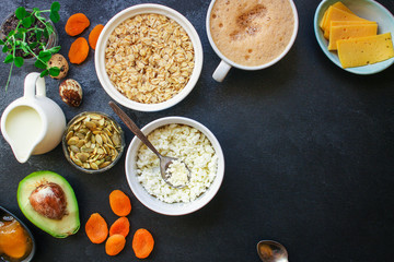 breakfast (oatmeal porridge, dairy products and more, snack) menu concept background. top view. copy space for text