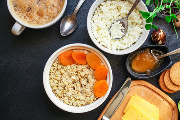 breakfast (oatmeal porridge, dairy products and more, snack) menu concept background. top view. copy space for text