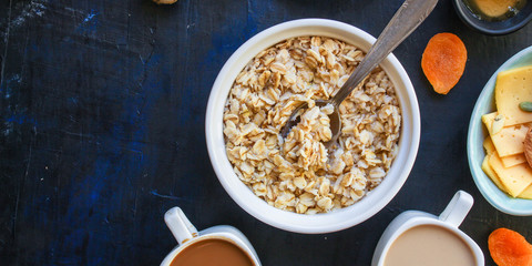 breakfast (oatmeal porridge, dairy products and more, snack) menu concept background. top view. copy space for text