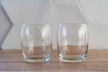 Empty glass on the kitchen table