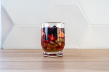 Homemade jelly with fruit in a glass