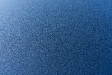 Technology blue background with dewdrops