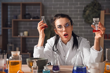 Crazy alchemist working in laboratory