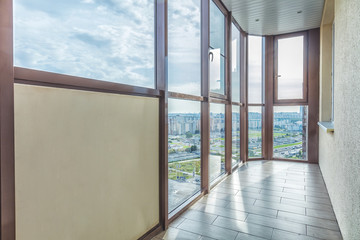 Fototapeta na wymiar Small balcony interior in modern apartment building