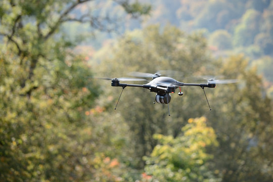 Black Flying Drone In Sky