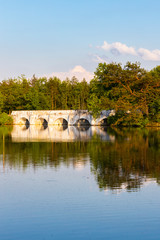 Naklejka premium Old stone bridge over Vitek pond, Nova Hlina near Trebon, Jindrichuv Hradec district, Southern Bohemian, Czech Republic