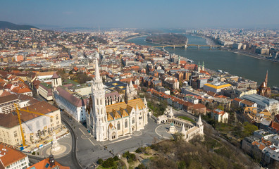 Fototapeta premium Empty tourist destination in Budapest, Hungary. People stay at home in self quarantine curfew, during the COVID-19 coronavirus. Matthias church, Buda castle, Fisherman's bastion in abandoned view. 
