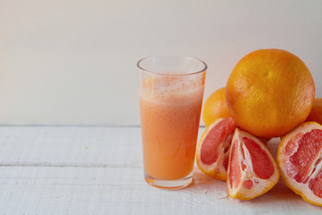 grapefruit juice on the light background