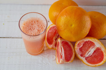grapefruit juice on the light background