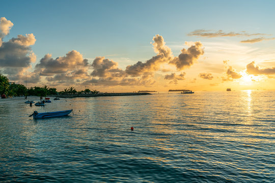 Golden sunset in bikini beach, Maafushi island, Maldives.