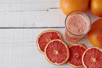grapefruit juice on the light background