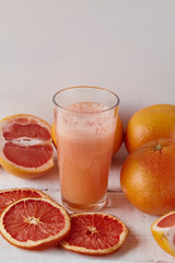 grapefruit juice on the light background