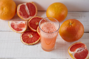 grapefruit juice on the light background