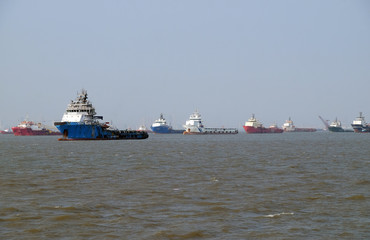 Fototapeta na wymiar Commercial ship at anchor in the Arabian Sea outside Mumbai, India