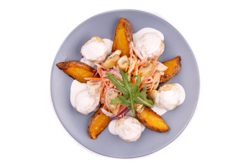 baked potato wedges with mushrooms vegetables and white sauce for the restaurant menu1
