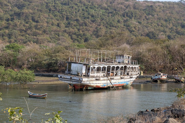 Abandoned tourist boat on Elefanta Island near Mumbai, India