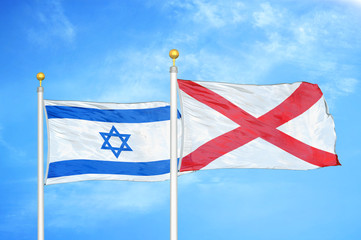 Israel and Northern Ireland two flags on flagpoles and blue cloudy sky